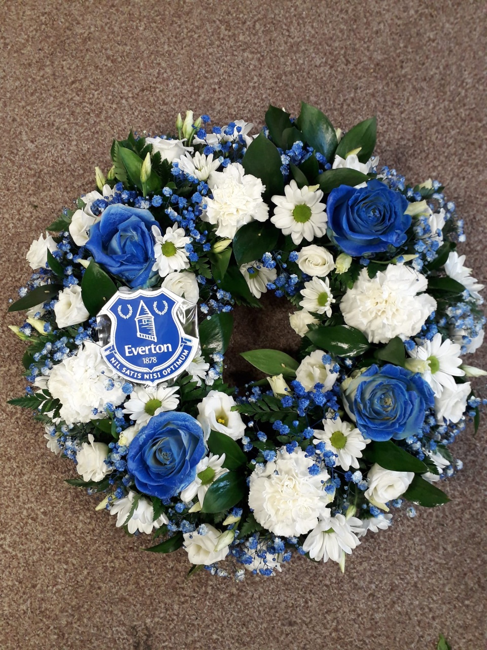 Special occasion bouquet Blue and white flower bouquet with Everton fc badge