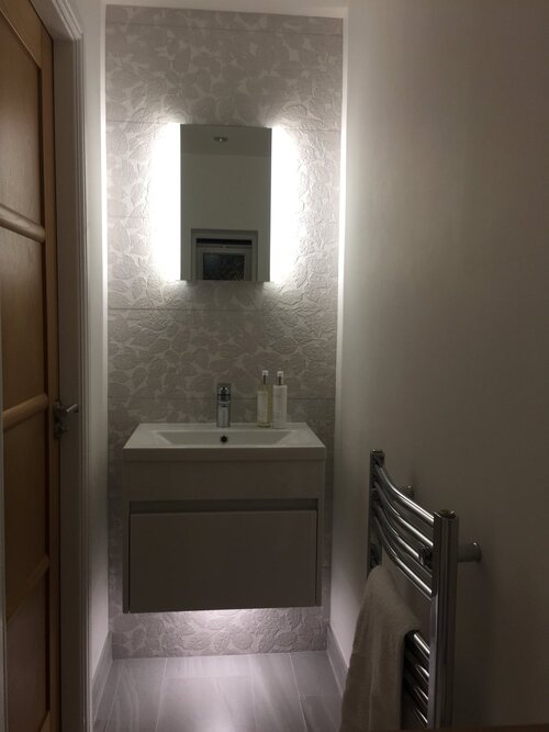 Installation of bathroom light above a sink